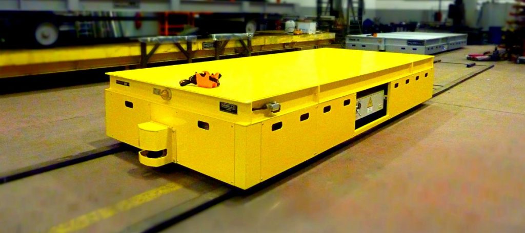 Chariot électrique guidé sur rails