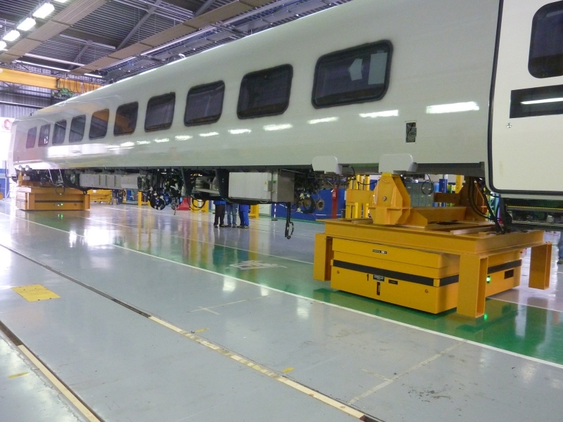 Modular trolleys moving railway carriages