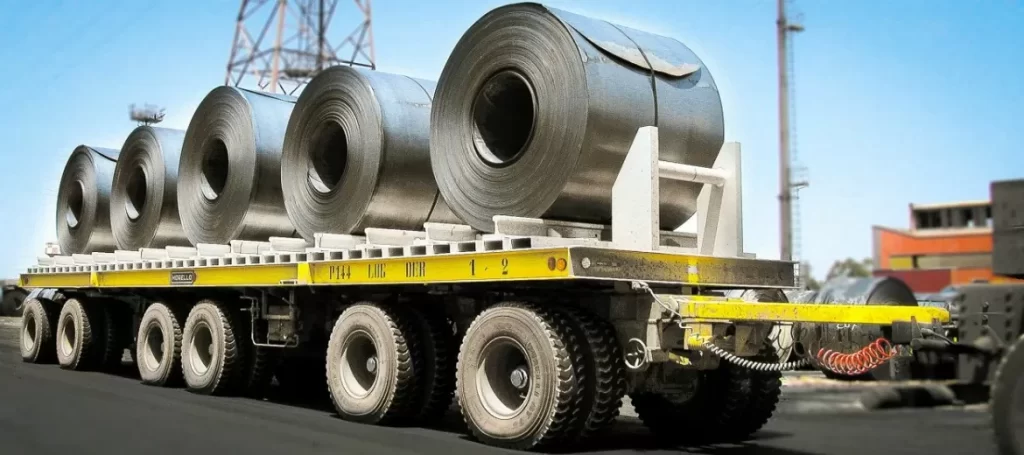 Towed trailer transporting coils